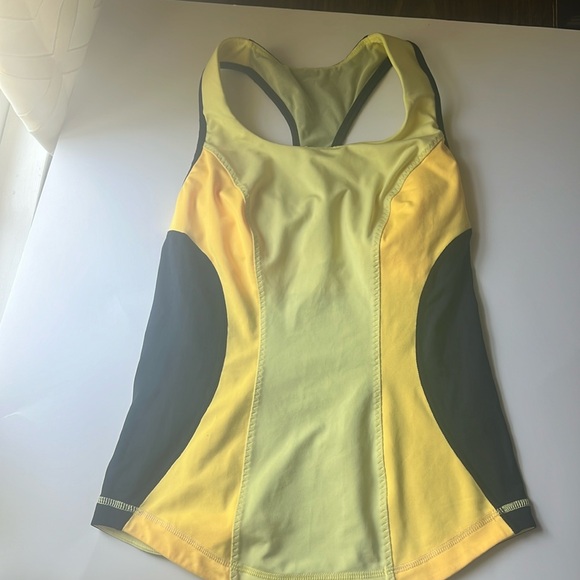 Lululemon Cardio Kick Tank
Mellow Lemon / Burning Yellow / Inkwell - Picture 2 of 9
